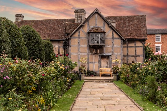 Home A beautiful Tudor-style house surrounded by a lush garden in Stratford-upon-Avon.